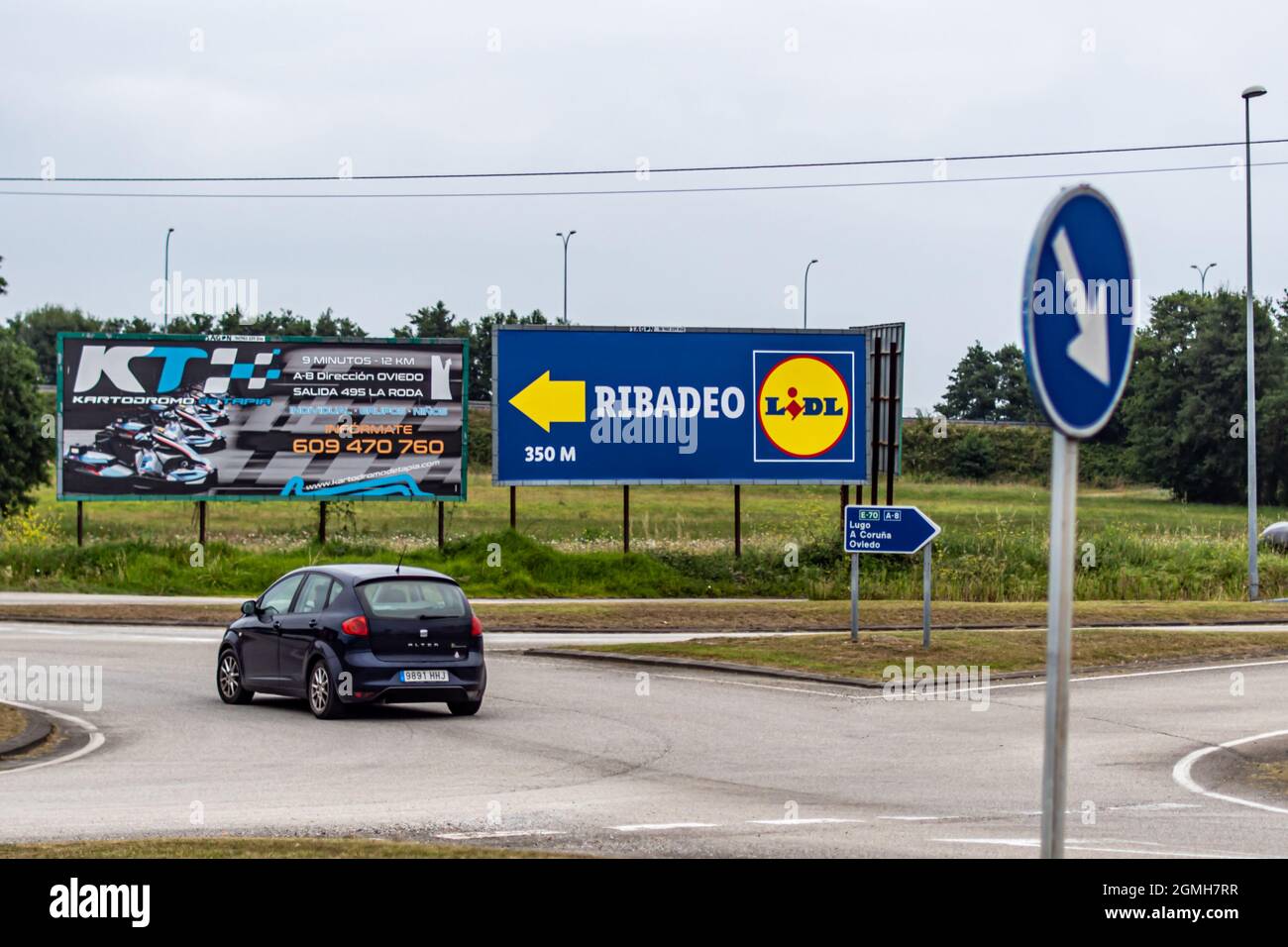 RIBADEO, SPAIN - Aug 31, 2021: a signage of LIDL brand shop on blue  billboard on lawn by road in Ribadeo, Spain Stock Photo - Alamy