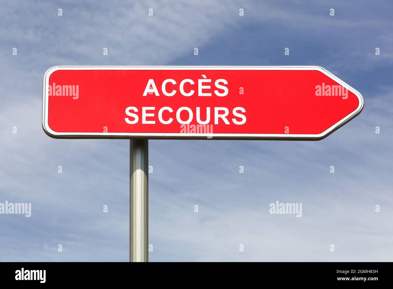 Emergency access road sign called acces secours in french language Stock Photo
