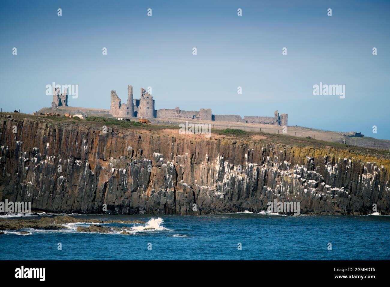 Dunstanburgh cliffs hi-res stock photography and images - Alamy