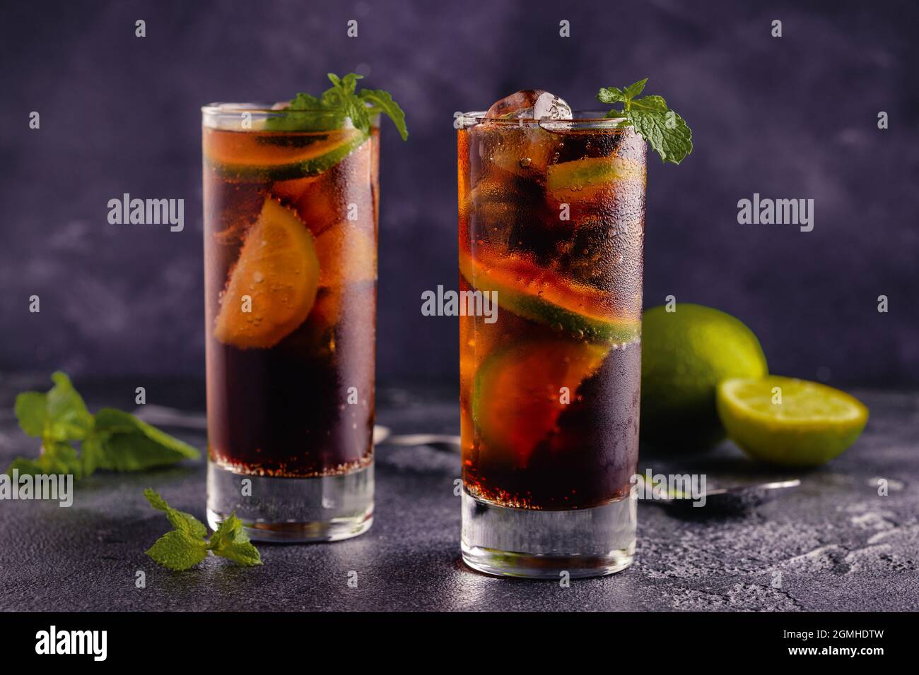 Rum and Cola cocktail Cuba Libre with lime and ice Stock Photo Alamy