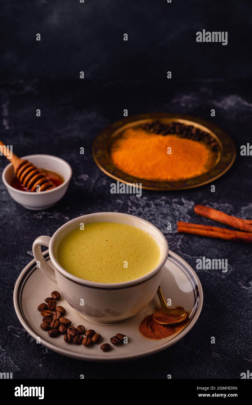 Coffee with turmeric, honey and cinnamon. Healthy drink Stock Photo Alamy