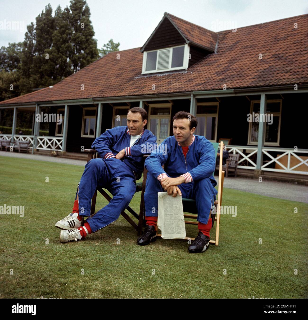 File photo dated 15-07-1966 of England's Jimmy Greaves and Jimmy Armfield take it easy during a training session at Roehampton Issue date: Sunday September 19, 2021. Stock Photo