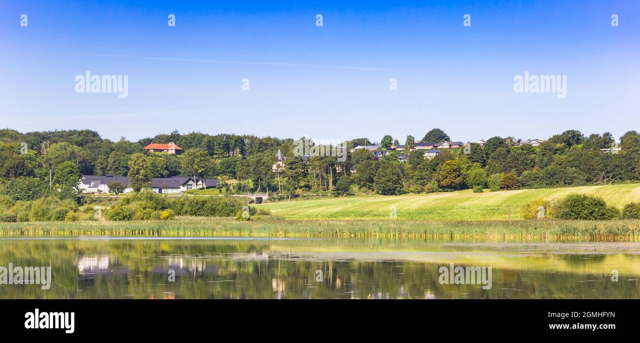 Panorama of houses on the hill in the landscape of Hobro, Denmark Stock Photo