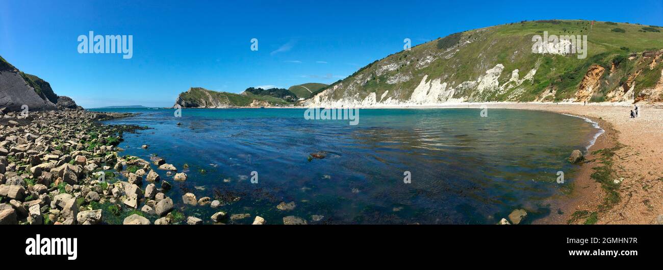 Lulworth Cove near West Lulworth, a village in the Purbeck district of Dorset on the south coast of England. The village is a gateway to the Jurassic Stock Photo