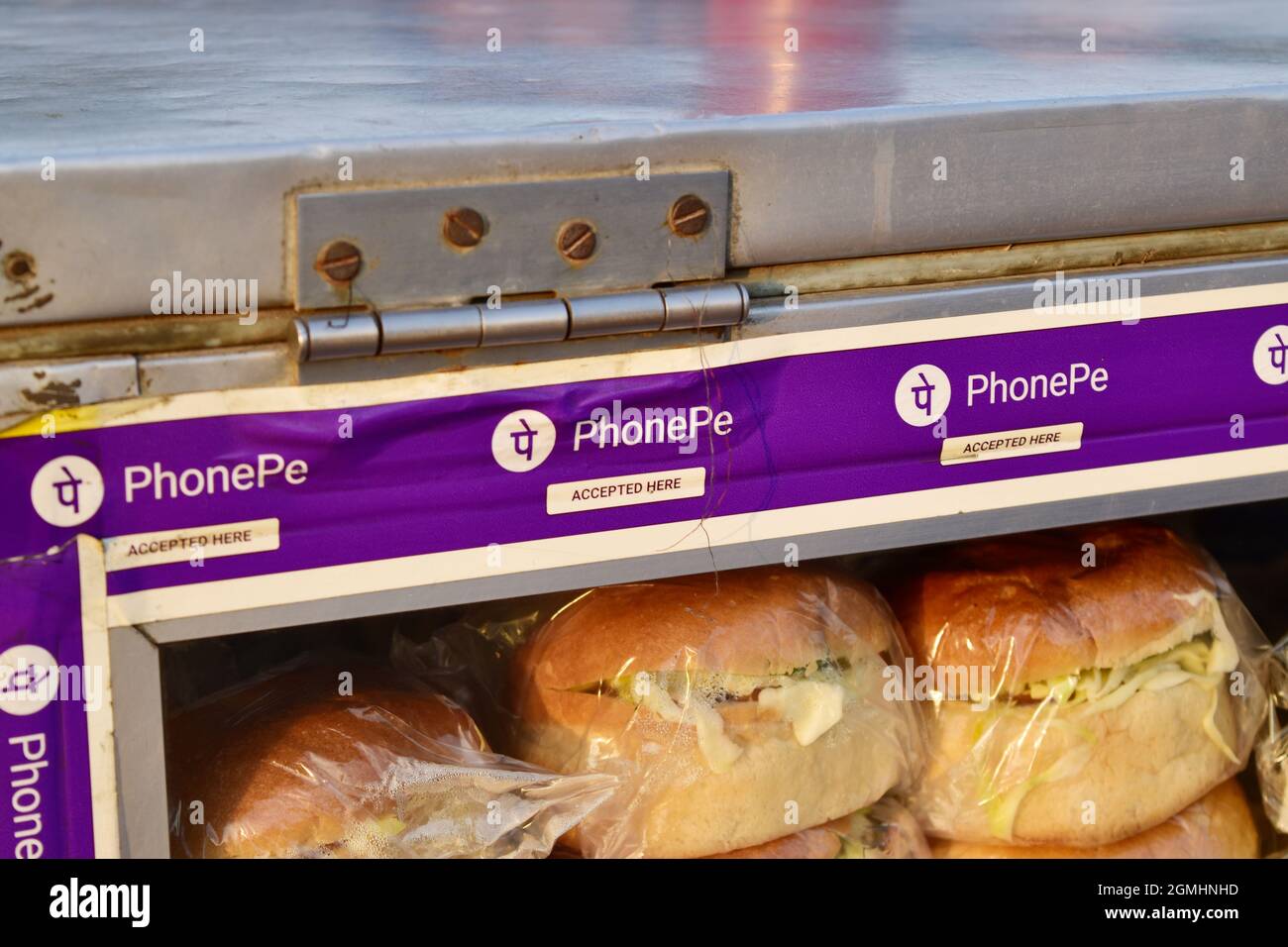 New Delhi, India, 12 January 2020:- phonepe accepted here tape on burger stall Stock Photo
