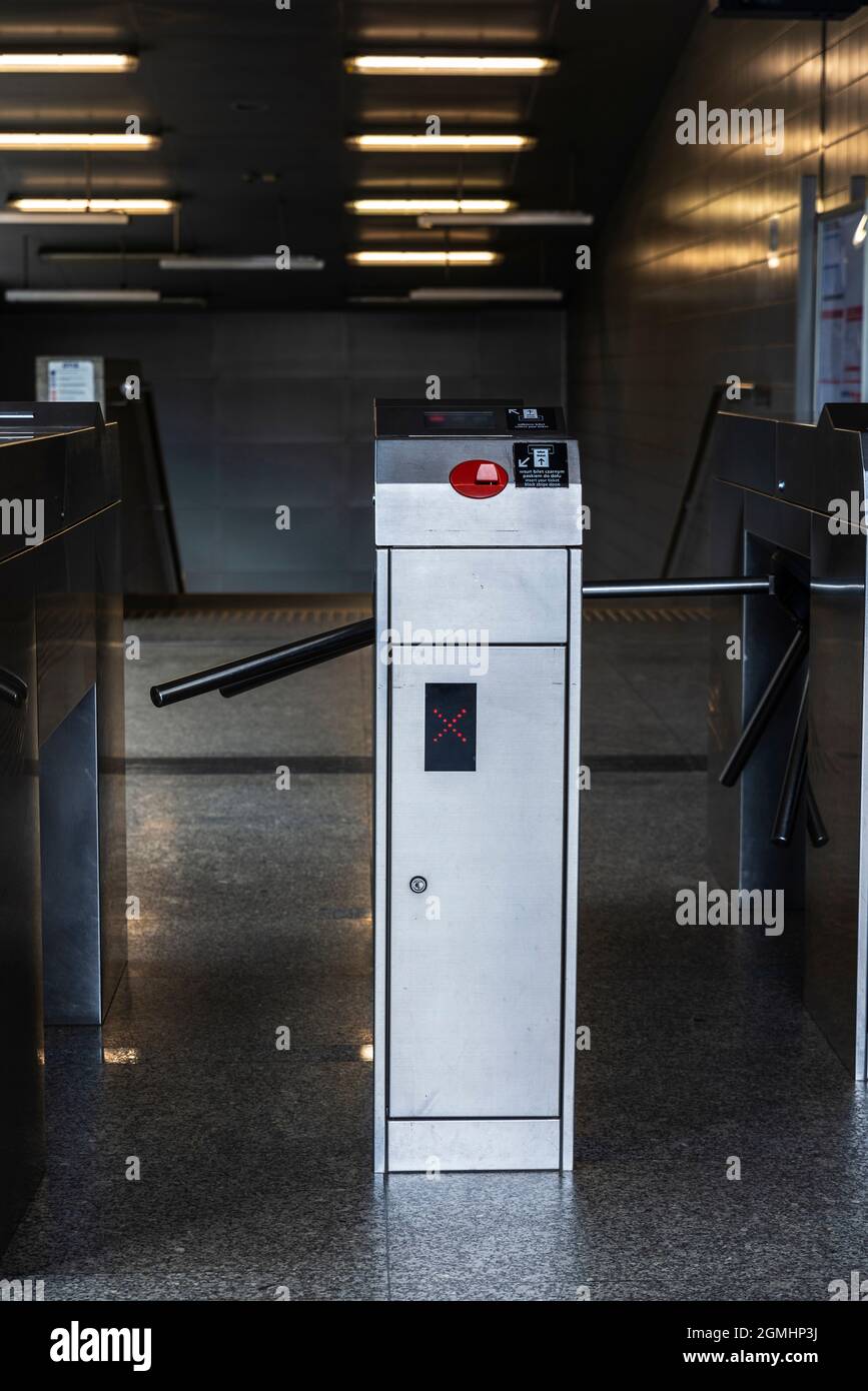 Automatic access control ticket barriers or turnstile in subway station ...