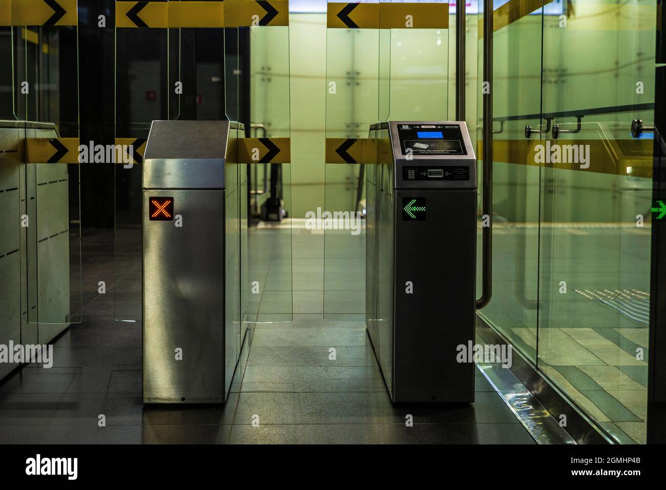 Automatic access control ticket barriers or turnstile in subway station ...