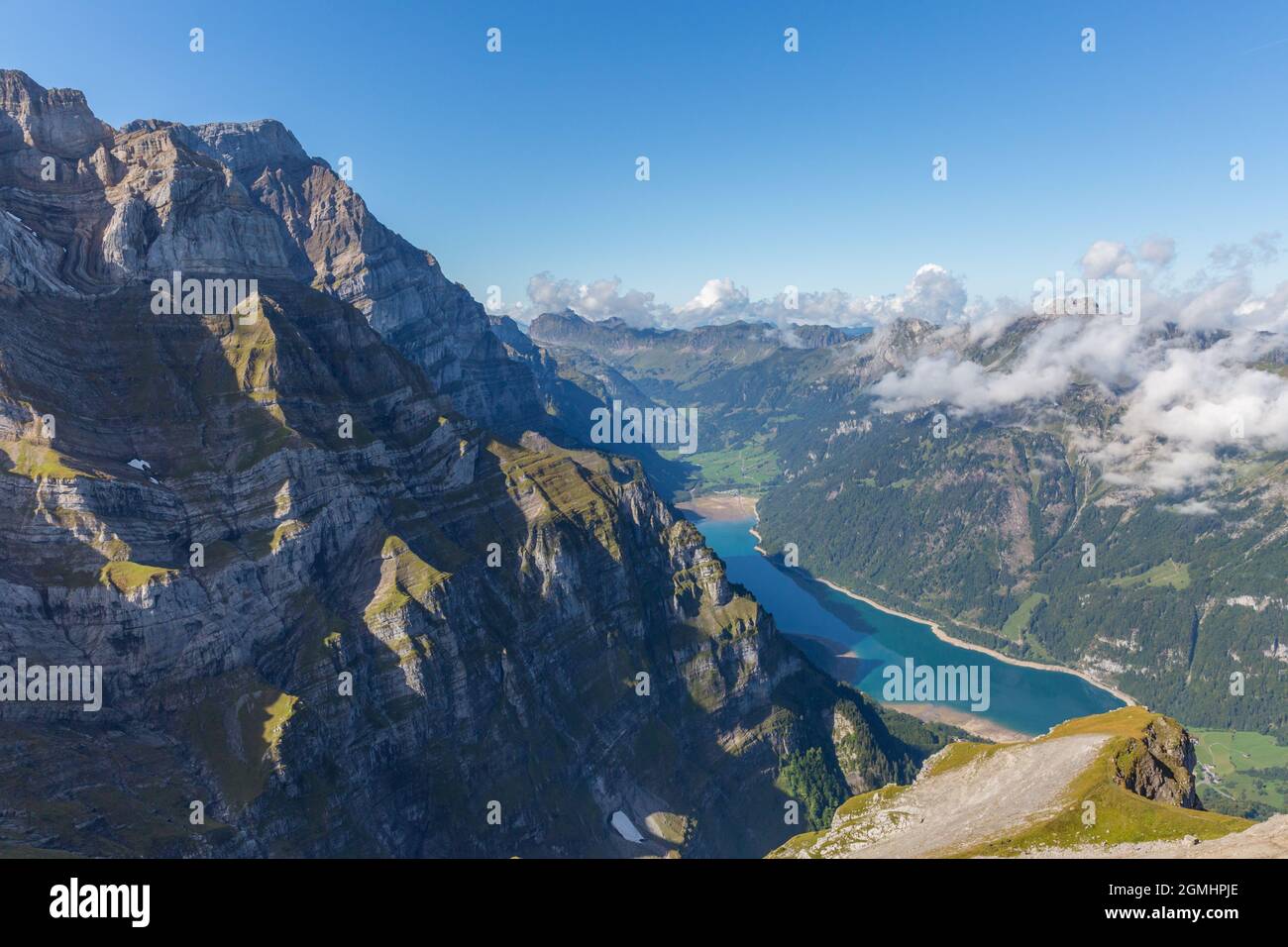 Swiss glaernisch mountain and lake kloental with blue sky Stock Photo