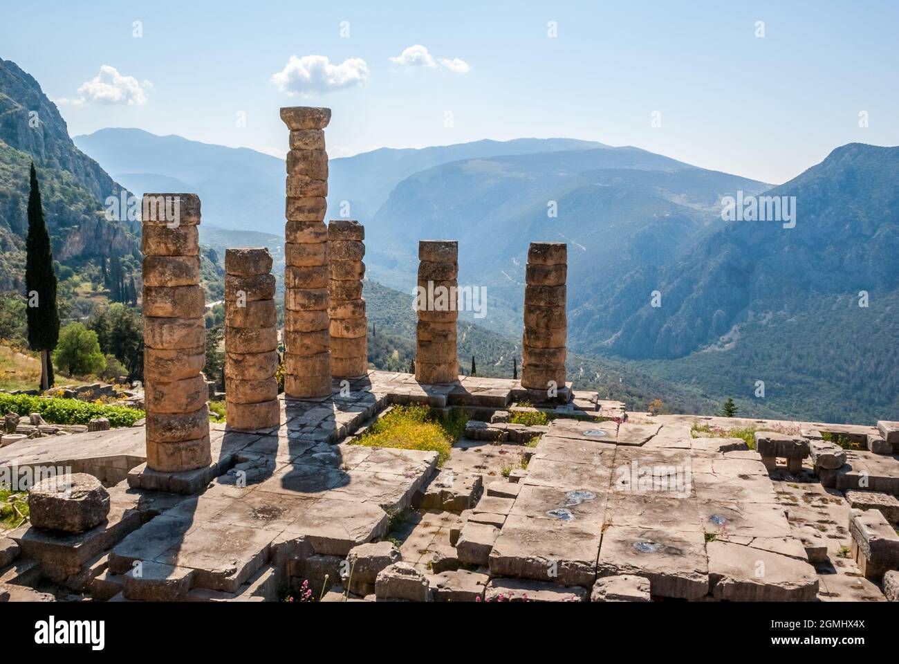 Ruins and columns of an ancient greek temple in front of the