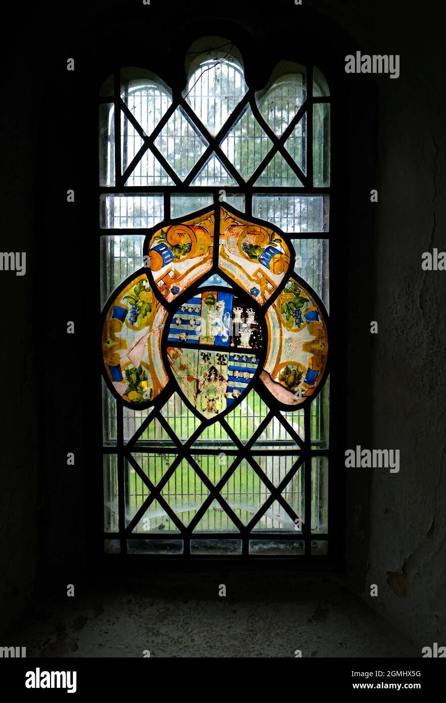 1598 painted glass coat of arms of Lord Burghley, William Cecil, in St Mary's Church, Walterstone, Herefordshire, England. He was buried in the church Stock Photo