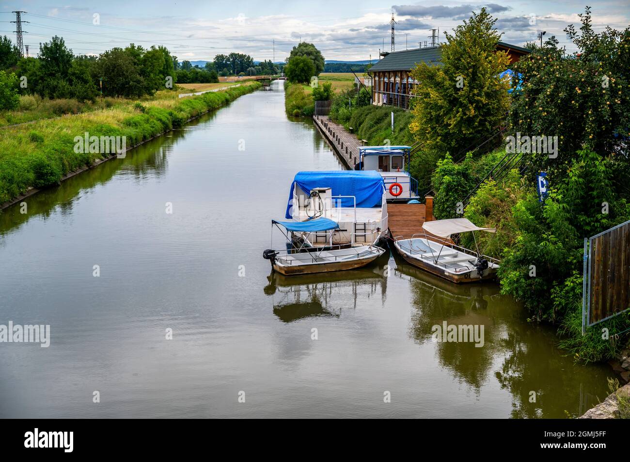 Bata water canal with boat and small pier, Uherske Hradiste, Czech republic  Stock Photo - Alamy