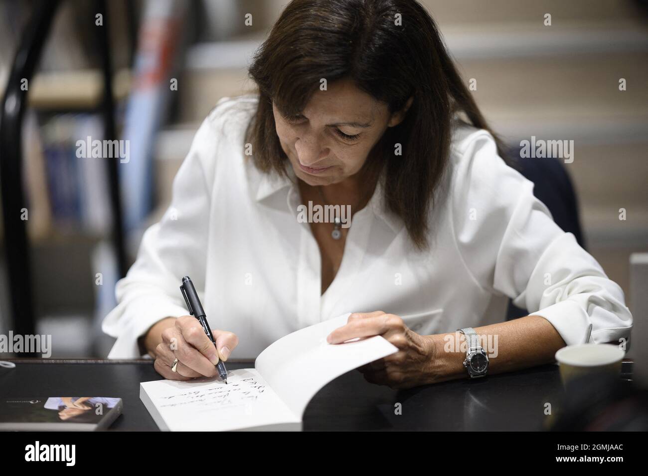 Paris, France. 19th Sep, 2021. Anne Hidalgo during a signing session of her book 'Une Femme Française' at the bookshop 'Le Divan Photo by Eliot Blondet/ABACAPRESS.COM Credit: Abaca Press/Alamy Live News Stock Photo