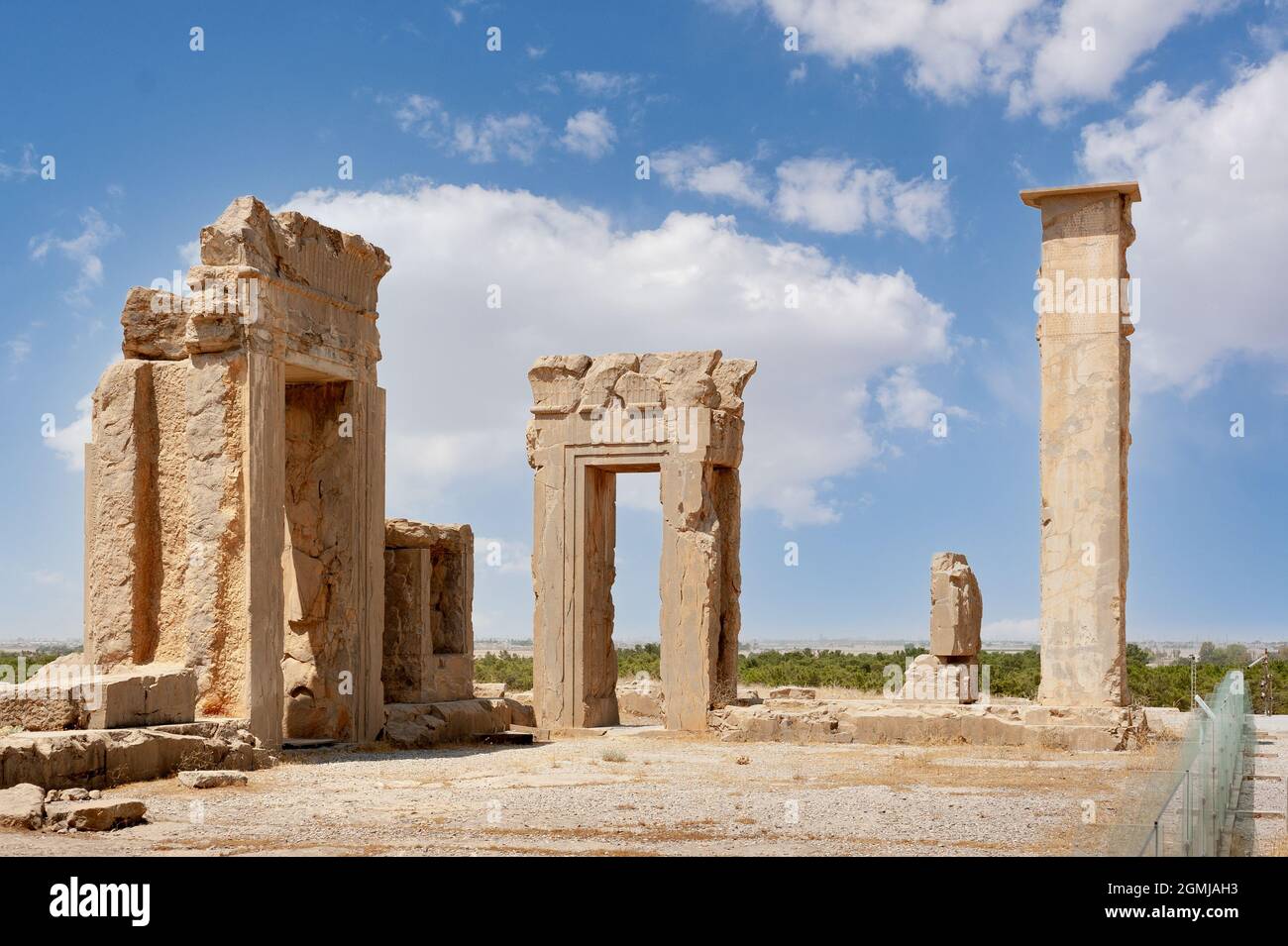 Fabulous view of ruins of the Hadish Palace (the Palace of Xerxes) on blue sky background in Persepolis, Iran. Ancient Persian city. Persepolis is a p Stock Photo