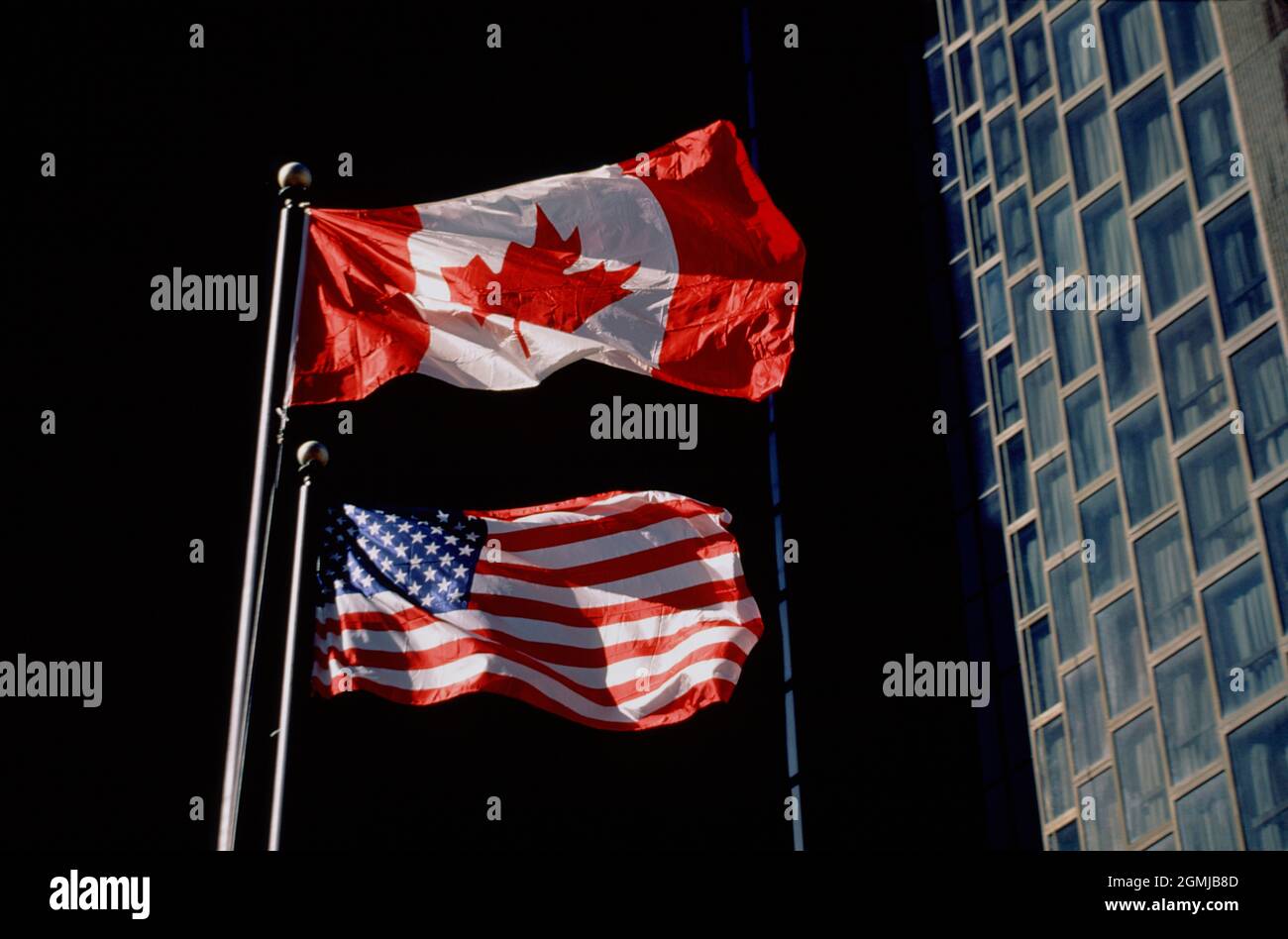 Canada. Montreal. Close up of Canadian and United States flags. Stock Photo