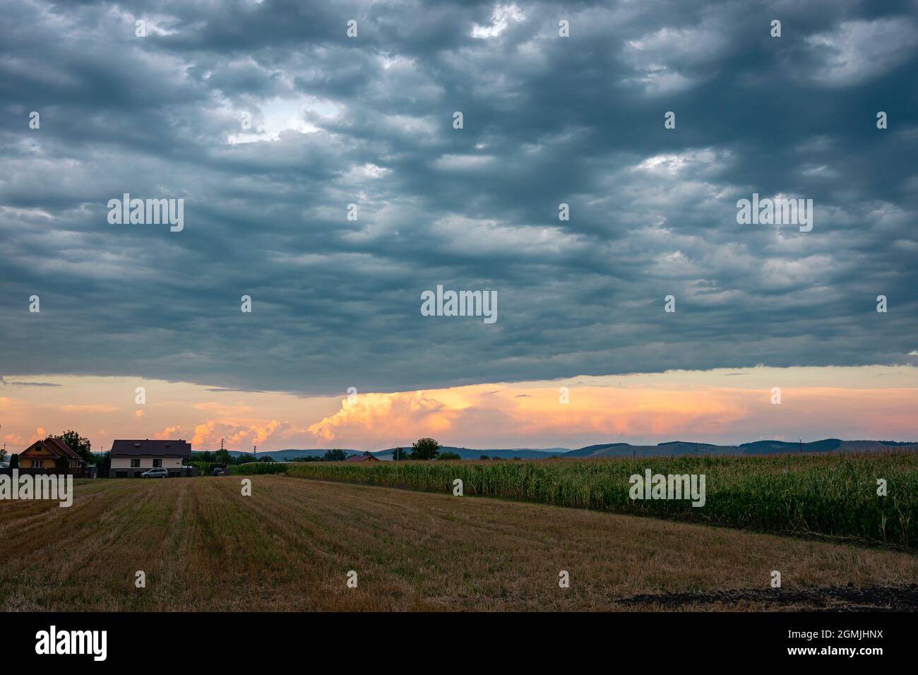 Dramatic looking sky as the first clouds accompanying a severe thunderstorm pass over the observer Stock Photo