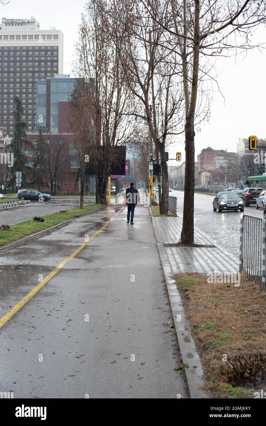 People walking in the rain, Sofia, Bulgaria, traveling, weather Stock