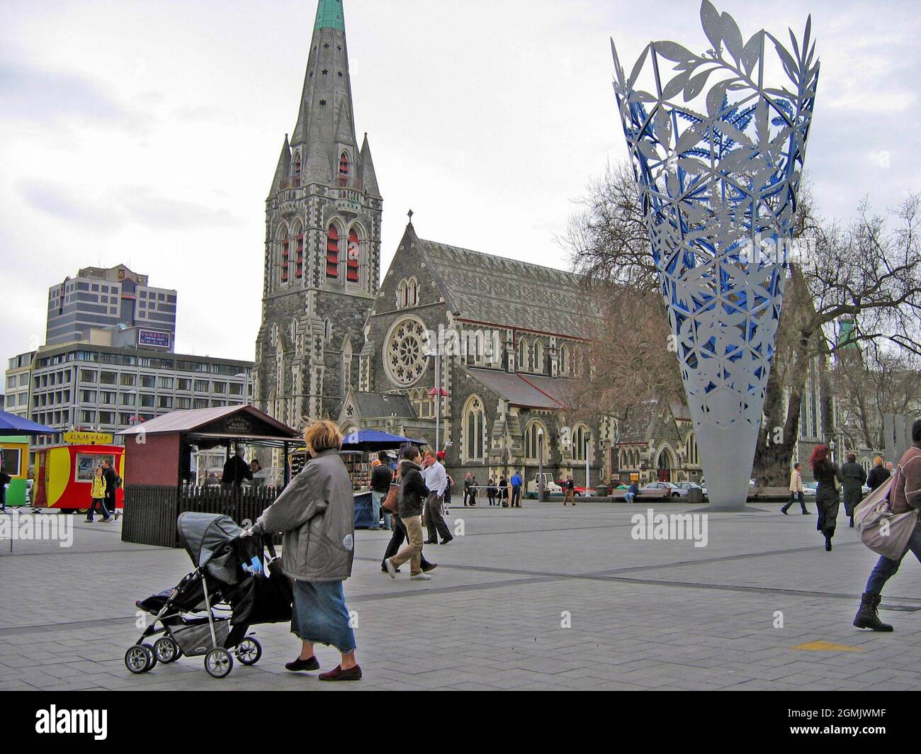 Christchurch Cathedral Square with the historic Anglican cathedral and the modern public art Chalice in Christchurch, New Zealand on September 14, 2004.  On February 22, 2011 a major earthquake struck Christchurch and the larger Canterbury region.  The 6.3 magnitude earthquake resulted in major damage to Cathedral Square and the ChristChurch Cathedral.  It is argued this was the fifth deadliest disaster in New Zealand history with an estimated 185 persons dying. Stock Photo