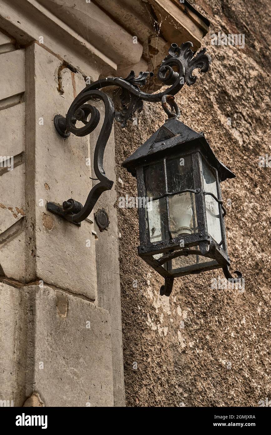 A very old, iron, medieval lamp Stock Photo - Alamy