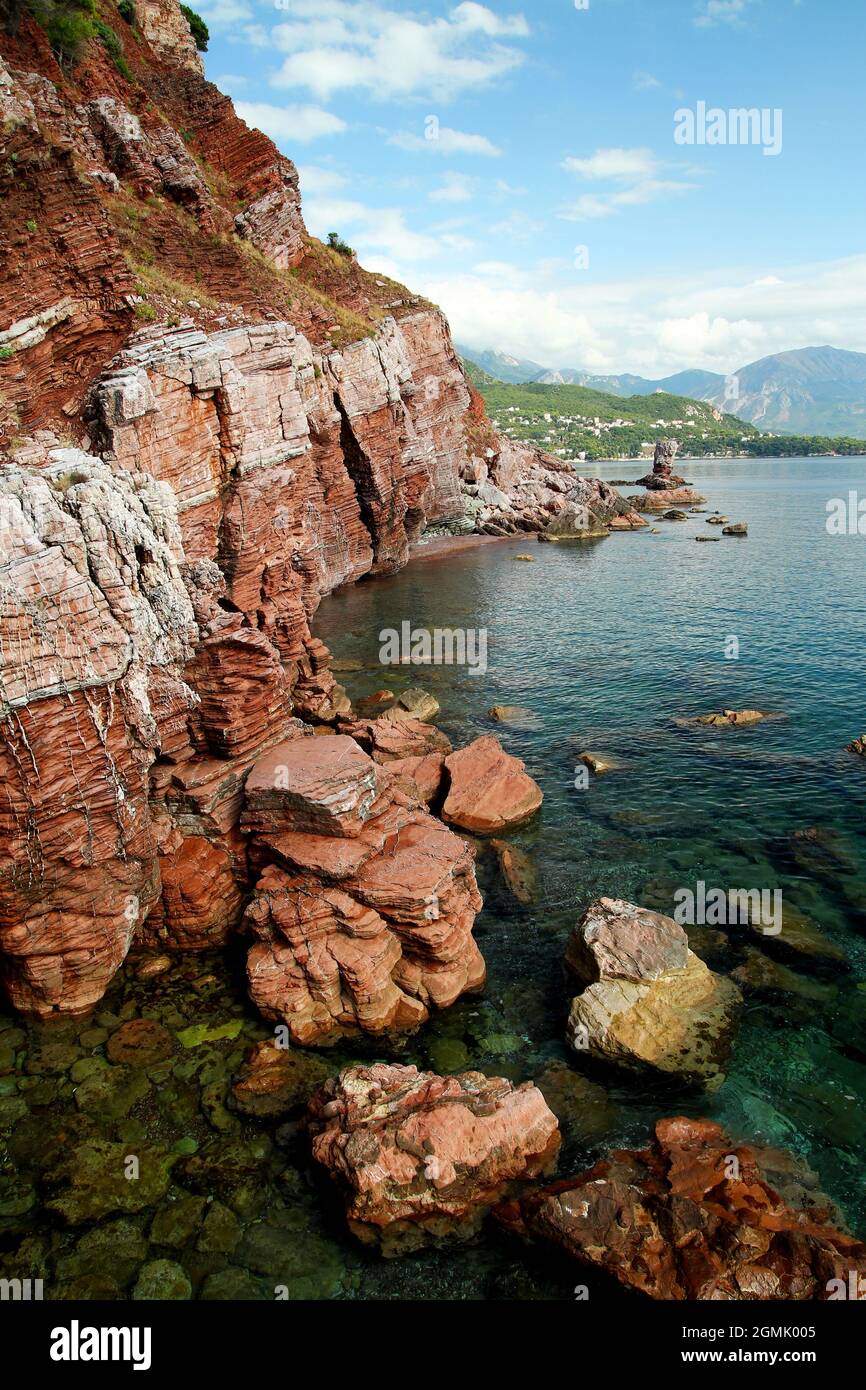 Red rocks at the Adriatic coast in Sutomore, Montenegro. Stock Photo