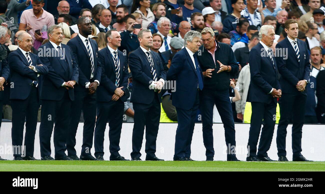 London, UK. 19th Sep, 2021. London, England - August 19:Ex Tottenham Hotspur players hold a minutes applause for Jimmy Greaves L-R Osvaldo Ardiles, Gary Mabbutt, Ledley King, Paul Allen, Mike Hazard, Steve Perryman, Glen Hoddle, Martin Chivers, Michael Dawson during Premier League between Tottenham Hotspur and Chelsea at Tottenham Hotspur stadium, London, England on 19h August 2021 Credit: Action Foto Sport/Alamy Live News Stock Photo