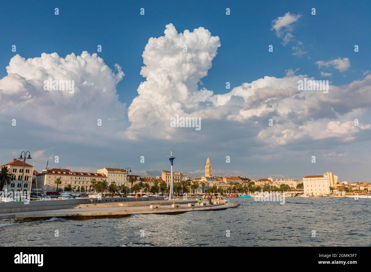 Split town with clouds in the sky Stock Photo