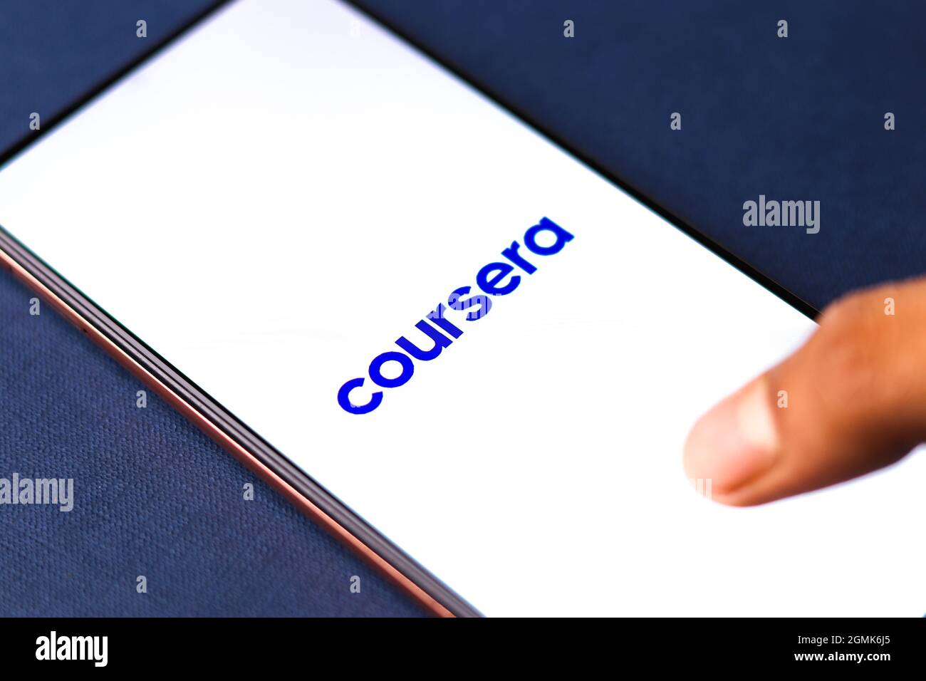West Bangal, India - August 21, 2021 : Coursera logo on phone screen stock image. Stock Photo