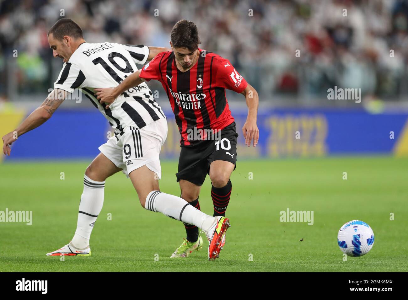 Turin, Italy, 19th September 2021. Brahim Diaz of AC Milan takes on Leonardo Bonucci of Juventus during the Serie A match at Allianz Stadium, Turin. Picture credit should read: Jonathan Moscrop / Sportimage Stock Photo