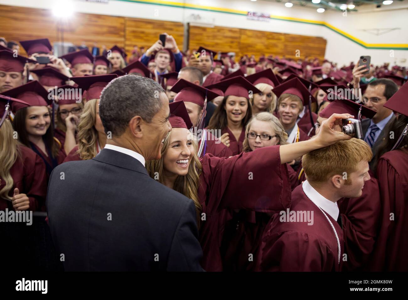 President Barack Obama greets graduating Joplin High School seniors before their commencement ceremony at Missouri Southern State University's Leggett & Platt Athletic Center in Joplin, Mo., May 21, 2012. (Official White House Photo by Pete Souza) This official White House photograph is being made available only for publication by news organizations and/or for personal use printing by the subject(s) of the photograph. The photograph may not be manipulated in any way and may not be used in commercial or political materials, advertisements, emails, products, promotions that in any way suggests a Stock Photo