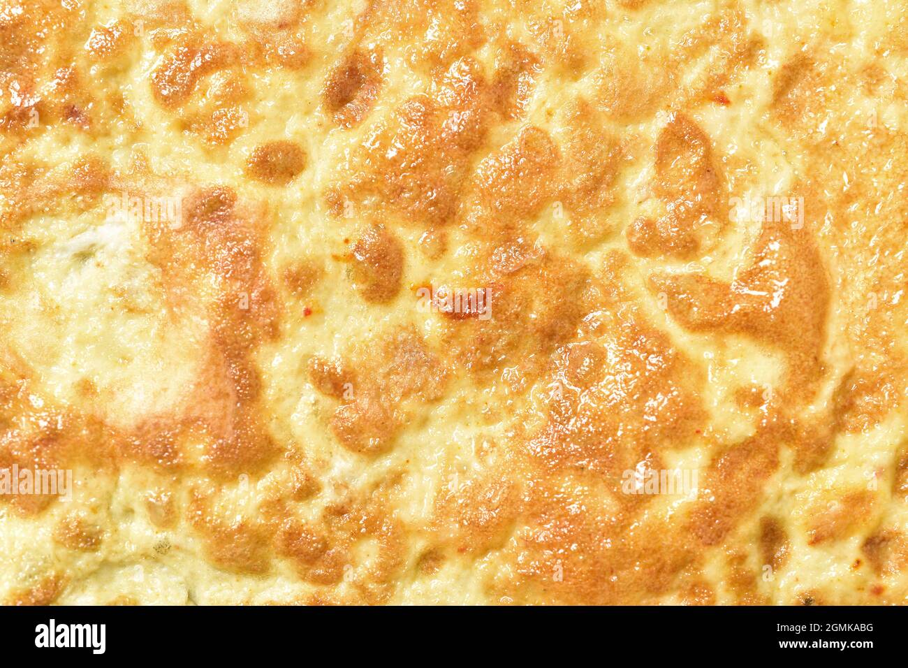 Making omelettes - folding over plain omelette using a large spatula Stock  Photo - Alamy