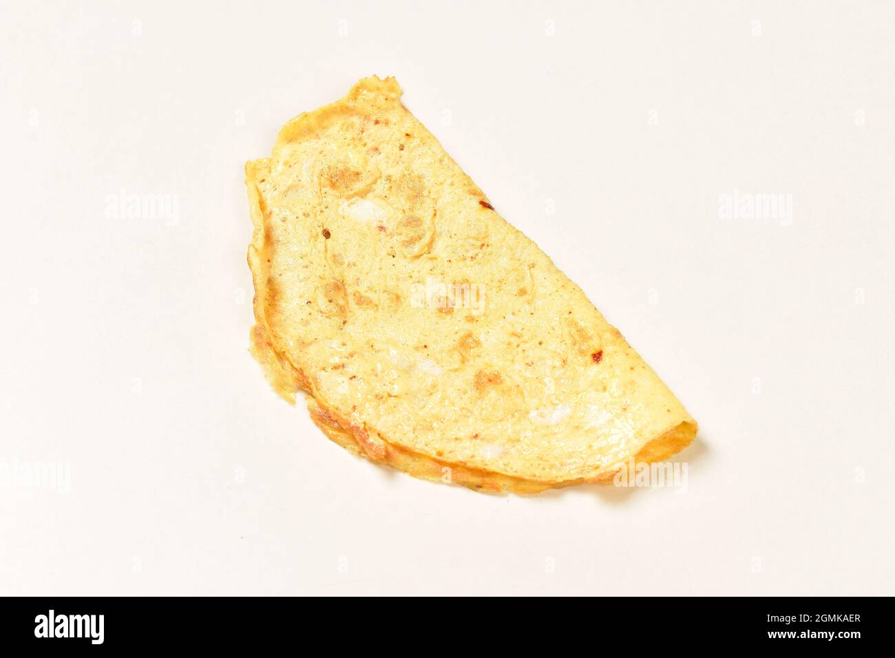 Folded Plain Omelet isolated on White Background Stock Photo