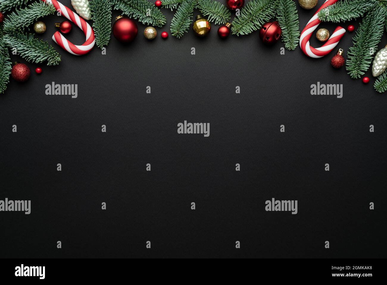 Christmas card with holiday frame on black background. Flat lay, top view and copy space for text Stock Photo