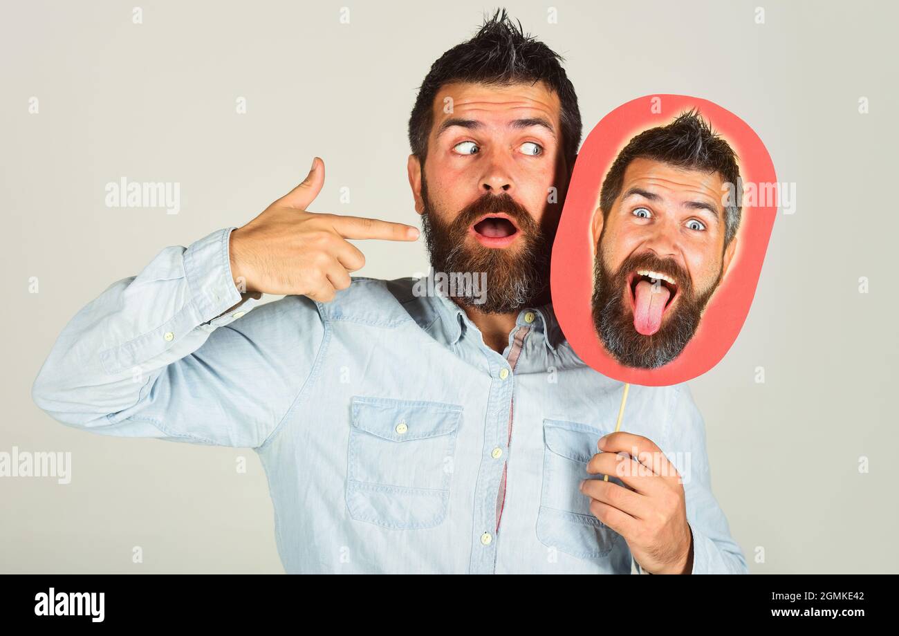 Surprised Man with nameplate with face. Barber fashion and beauty. Feeling and emotions. Face expression. Stock Photo