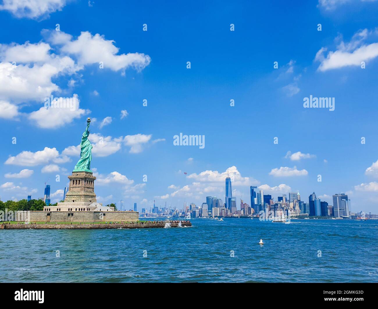 Iconic New York City view from Staten Island ferry over Statue of