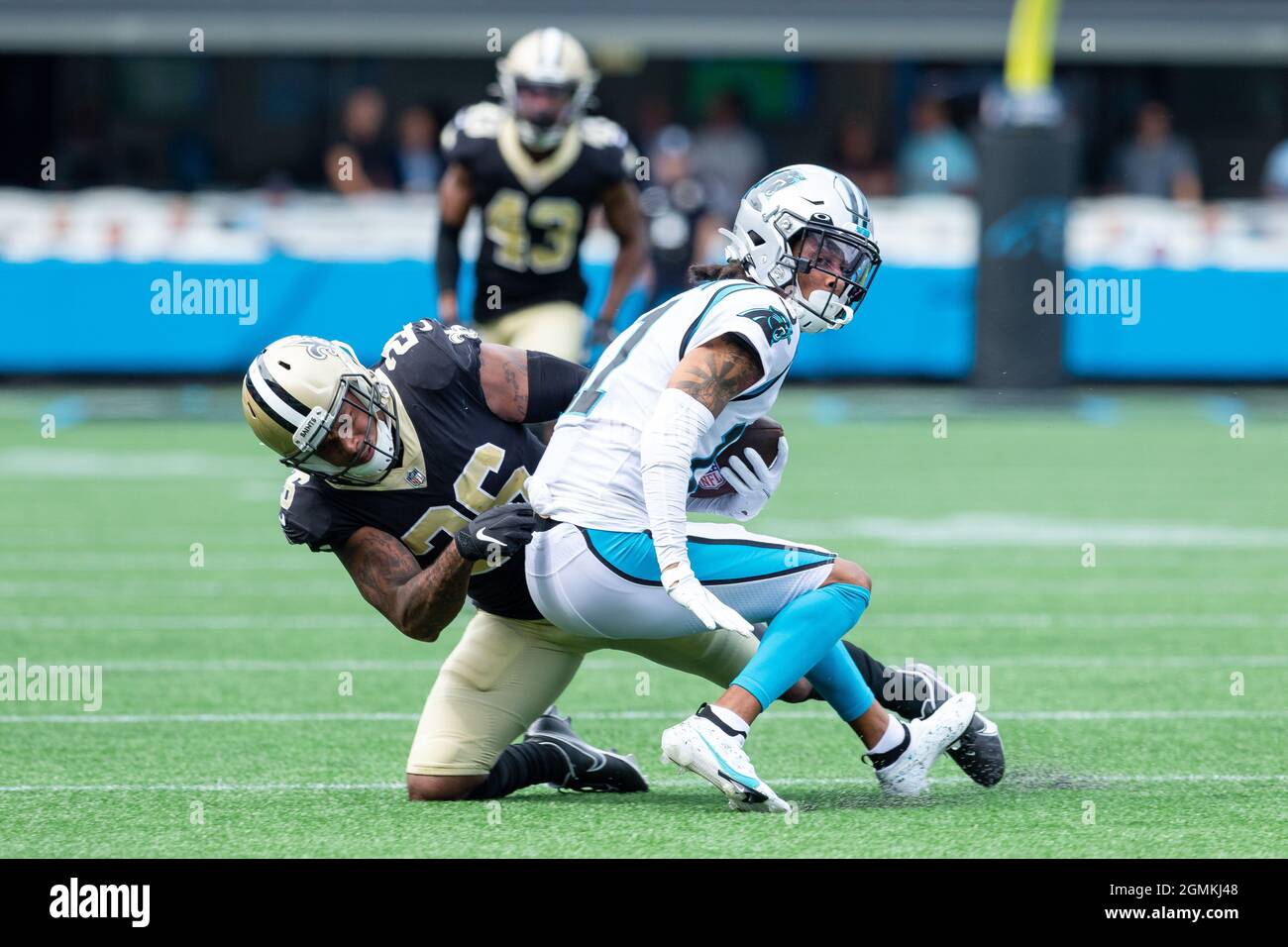 September 19, 2021: Carolina Panthers wide receiver Robby Anderson (11) gets pulled down by New Orleans Saints cornerback P.J. Williams (26) in the fourth quarter of the NFL matchup at Bank of America Stadium in Charlotte, NC. (Scott Kinser/Cal Sport Media) Stock Photo