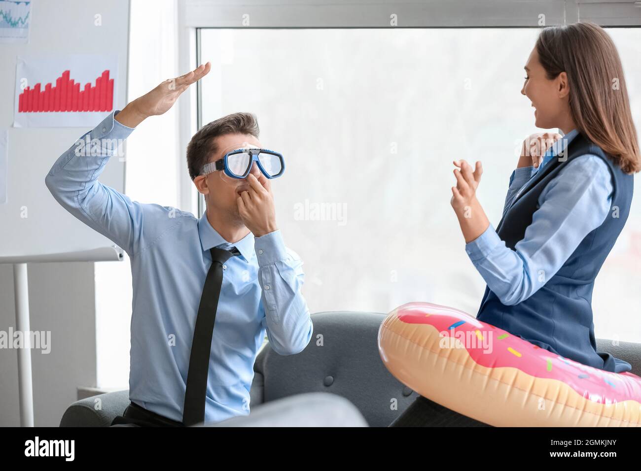 Career woman on inflatable ring hi-res stock photography and images - Alamy