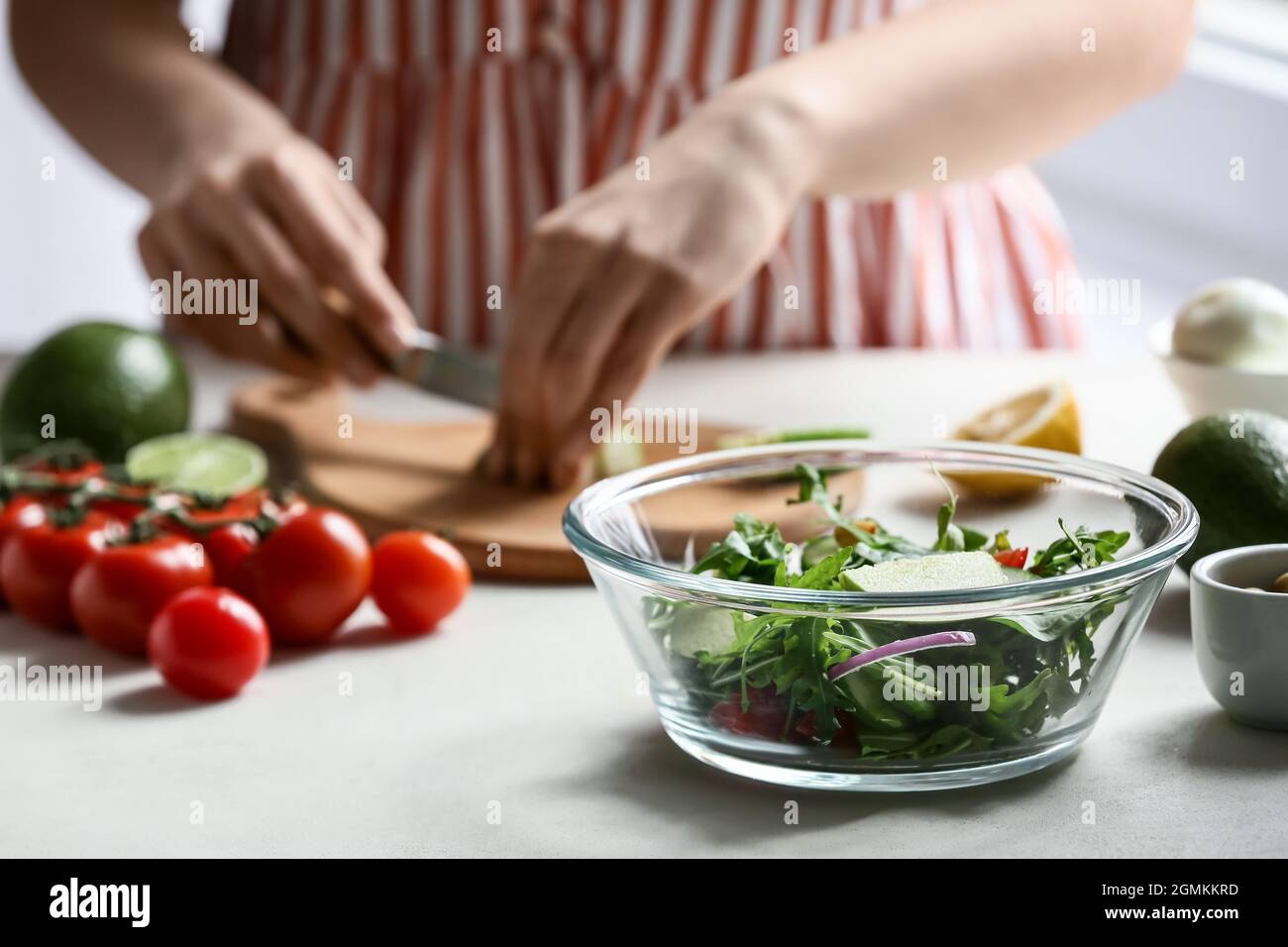 Woman cutting onion in slices hi-res stock photography and images - Alamy
