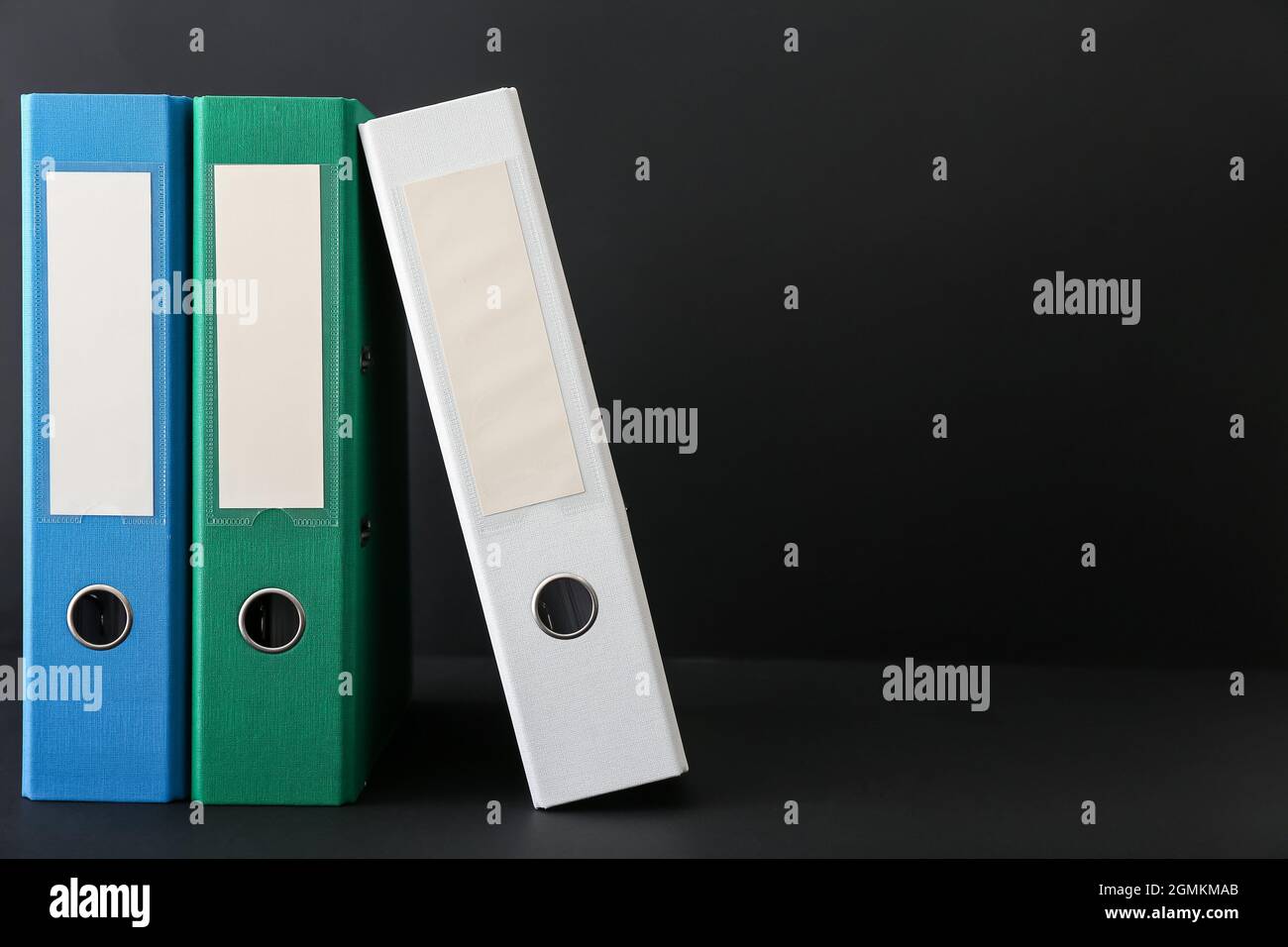Office folders on dark background Stock Photo