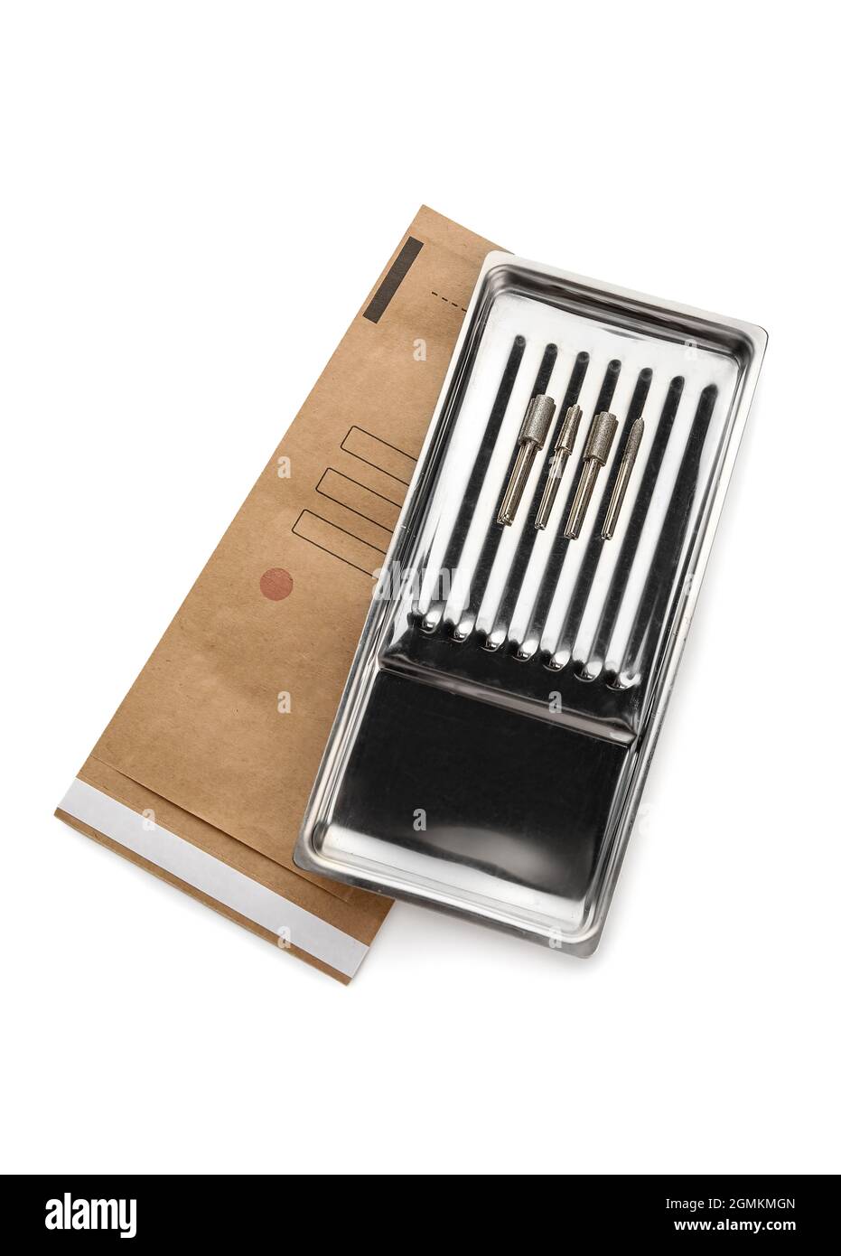 Container with clean manicure tools on white background Stock Photo