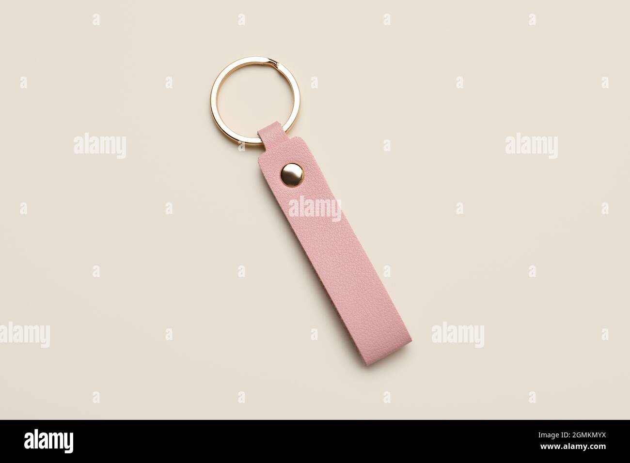 Leather keychain on light background Stock Photo