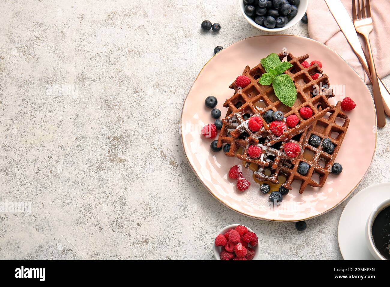 Plate of delicious Chocolate Belgian Waffles with berries on light ...