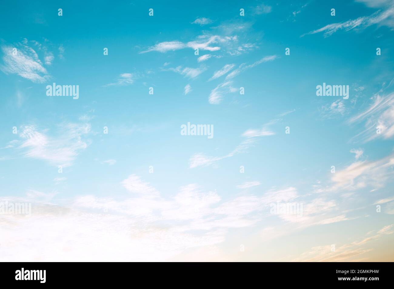Bright blue sky with the white clouds Stock Photo