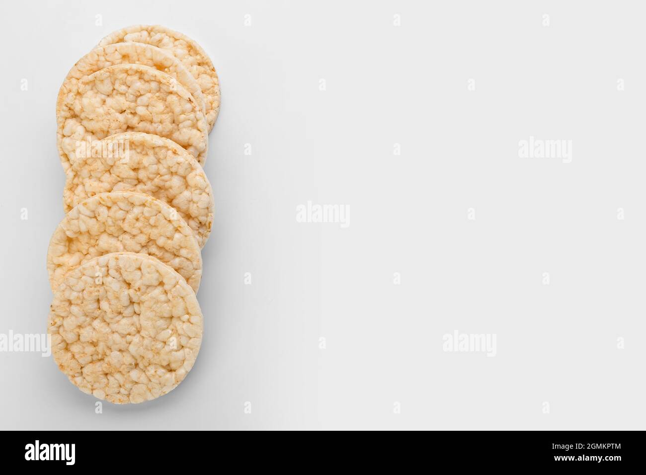Puffed rice crackers on white background Stock Photo Alamy