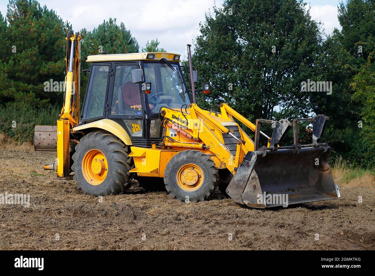JCB Sitemaster at work in a field Stock Photo