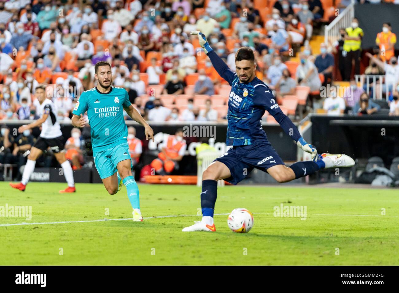 Valencia, Spain. 19th Sep, 2021. Giorgi Mamardashvili of Valencia CF and  Eden Hazard of Real Madrid are seen in action during the Spanish La Liga,  football match between Valencia CF and Real
