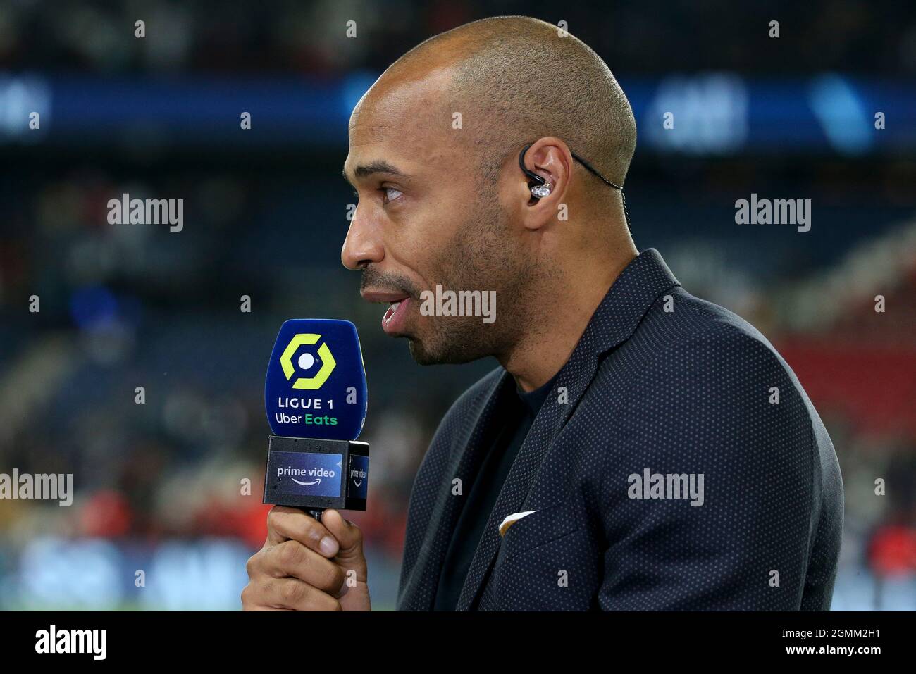Paris, France. 19th Sep, 2021. Thierry Henry, pundit for Amazon Prime,  comments the French championship Ligue 1 football match between Paris  Saint-Germain (PSG) and Olympique Lyonnais on September 19, 2021 at Parc