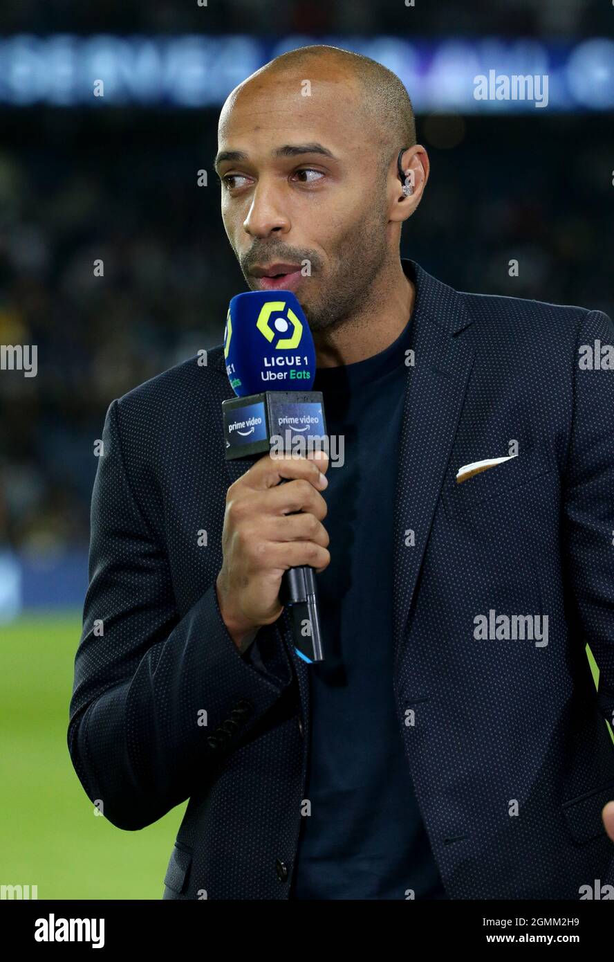 Paris, France. 19th Sep, 2021. Thierry Henry, pundit for Amazon Prime,  comments the French championship Ligue 1 football match between Paris Saint- Germain (PSG) and Olympique Lyonnais on September 19, 2021 at Parc