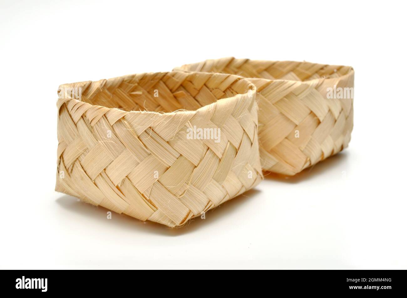 Traditional containers made of bamboo white background studio shoot ...