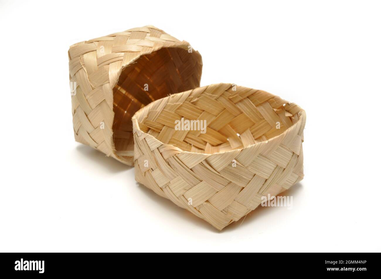 Traditional containers made of bamboo white background studio shoot ...