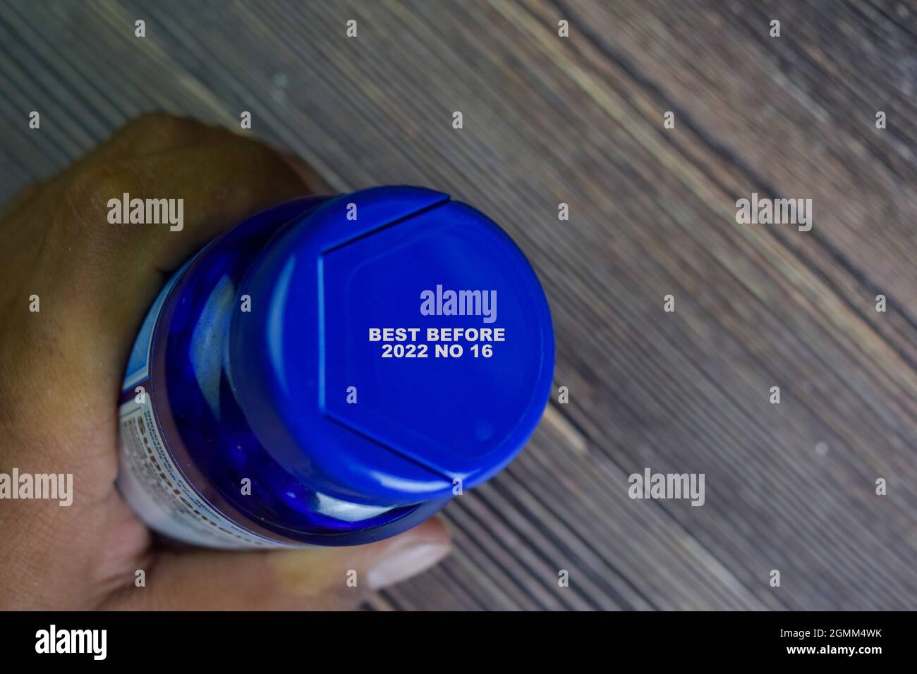 Close up text Best Before Date on Bottle Cap Food Stock Photo