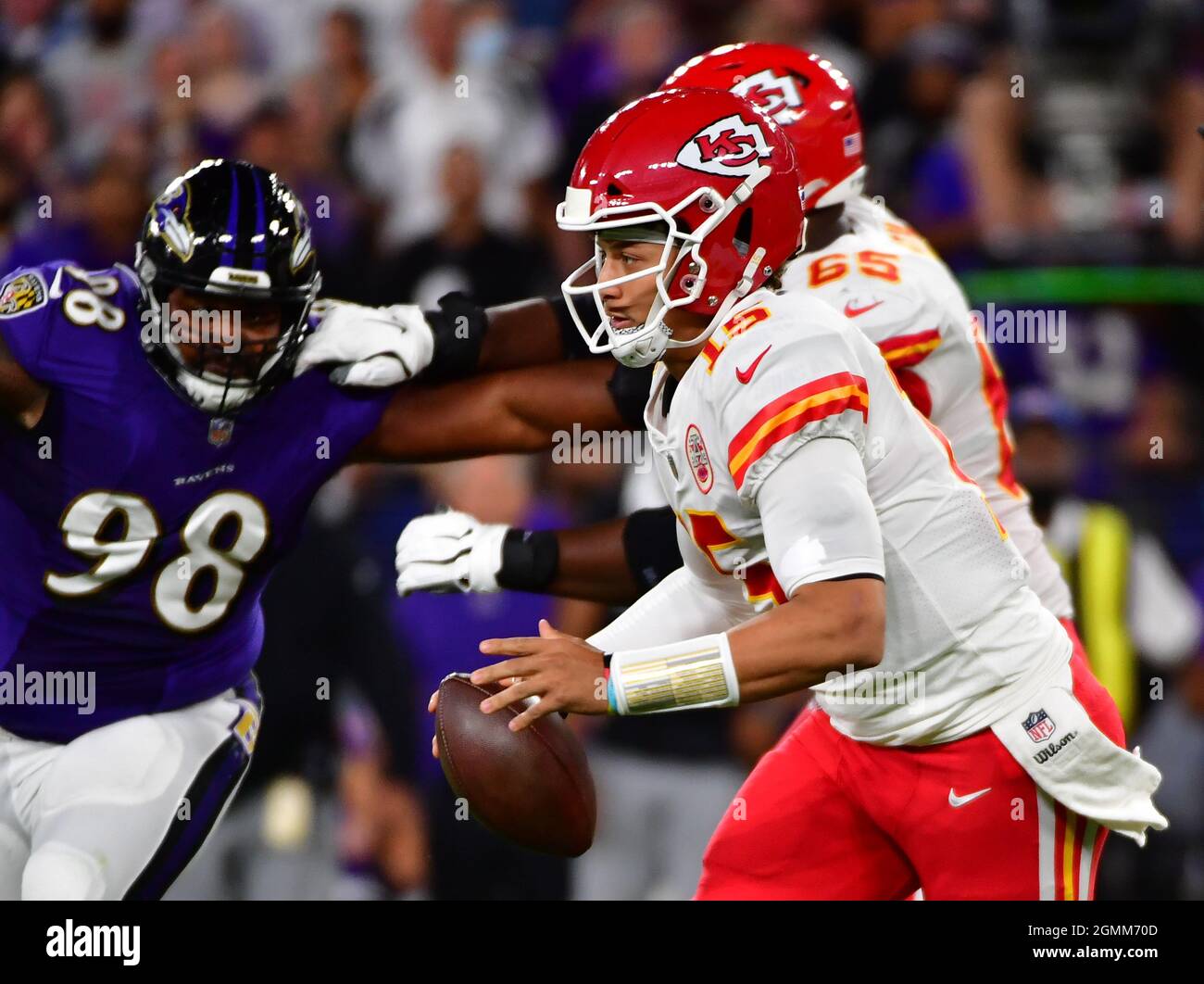 Kansas City Chiefs quarterback Patrick Mahomes (15) scrambles on a